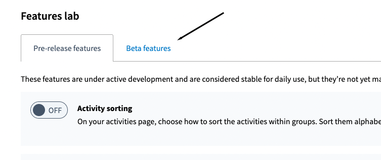 arrow pointing to beta features tab