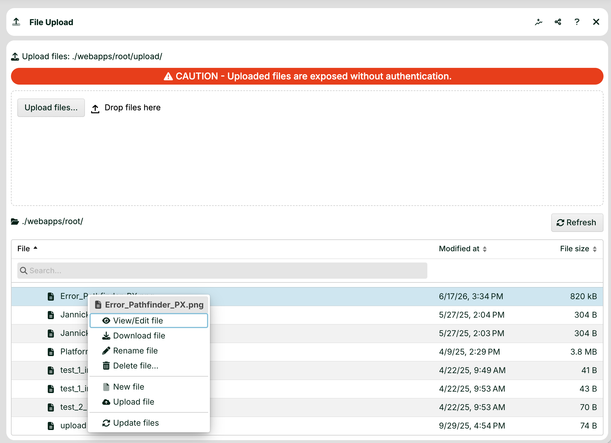 File upload interface showing caution about exposed files and file management options.