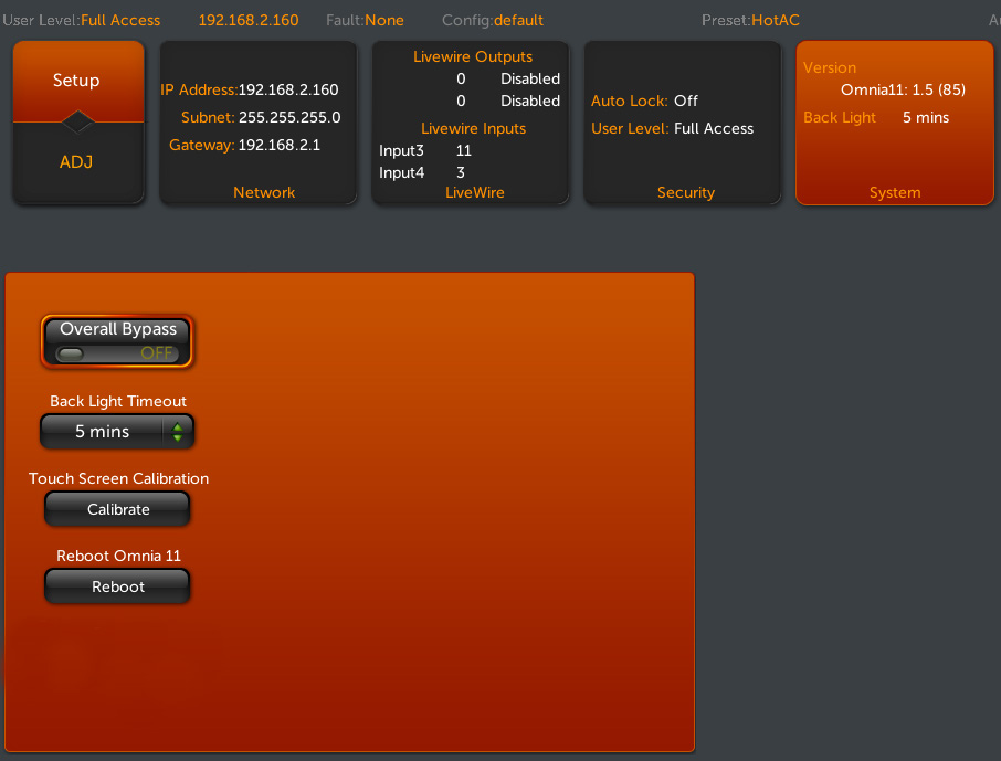 A system setup screen showing dark gray background with orange panels and buttons; left side has Setup and ADJ buttons, top area displays IP, Livewire and version/status boxes, and a large orange panel contains controls labeled Overall Bypass, Back Light Timeout, Calibrate, and Reboot.