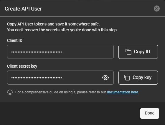 Create API User dialog showing the masked Client ID and Client secret key with the Copy ID and Copy key buttons, a link to the documentation, and the Done button