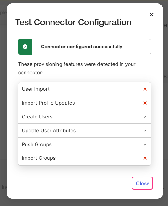 The Okta dialog confirming that the connector configuration test succeeded, with the detected provisioning features listed