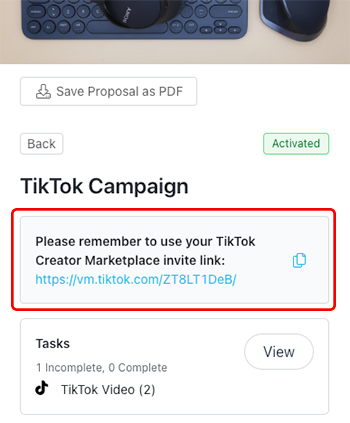 Image of a proposal's details on the Live Site with the TikTok Creator Marketplace invite link highlighted