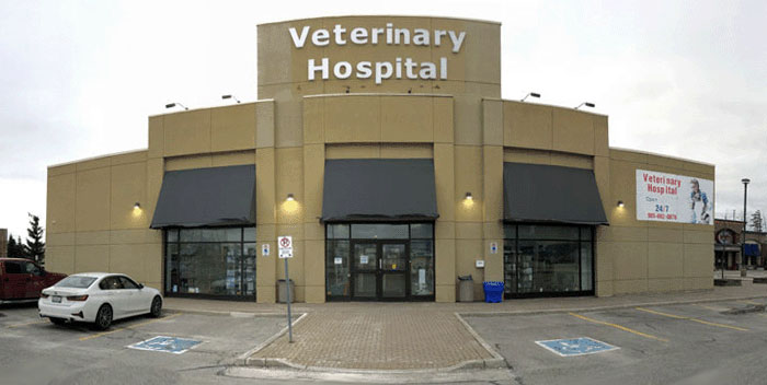 A building with a sign on the front Description automatically generated